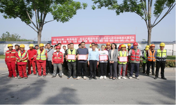 开云体育 开云平台西安浐灞国际港基层技能练兵-园林绿化领域绿篱修剪技能比武大赛成功举办(图2)